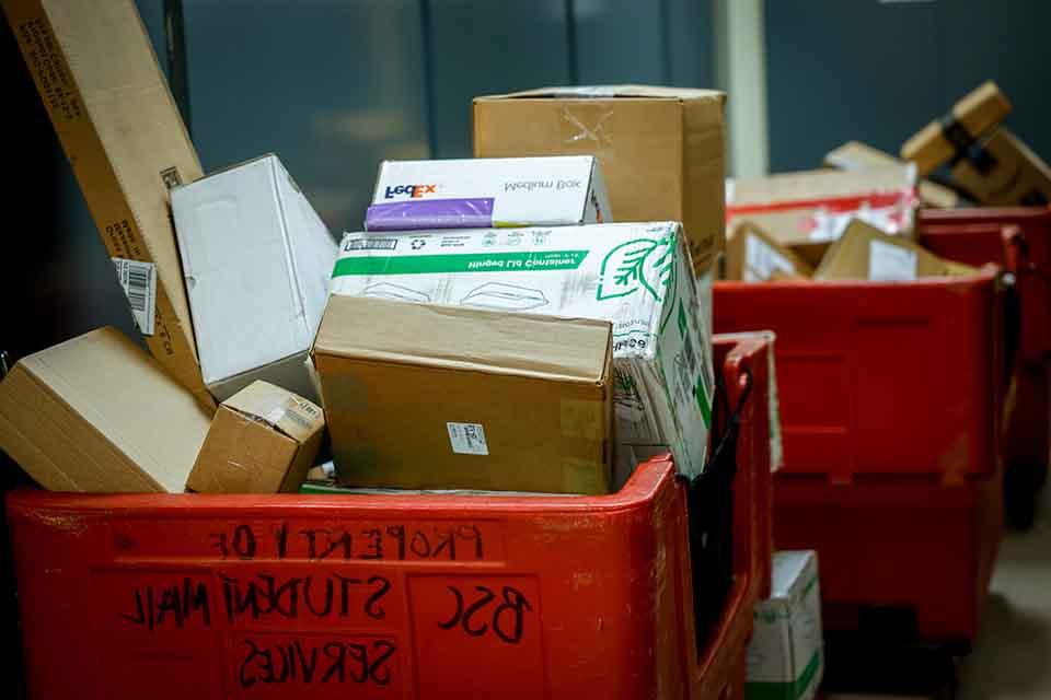 Packages stacked in the mailroom
